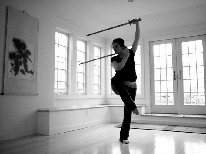 pregnant warrior with one knee up